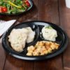 8 7/8" Black 3 Compartment Laminated Foam Plate - 500/Case - Image 2
